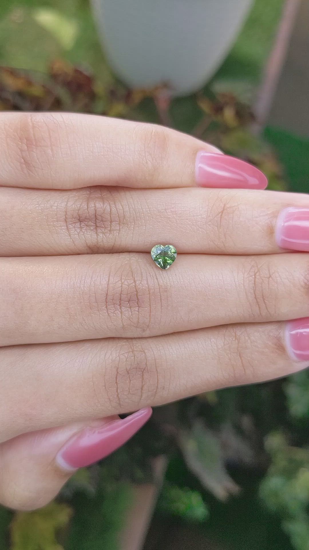 0.67 Ct. Yellowish Green Sapphire from Madagascar Size Video