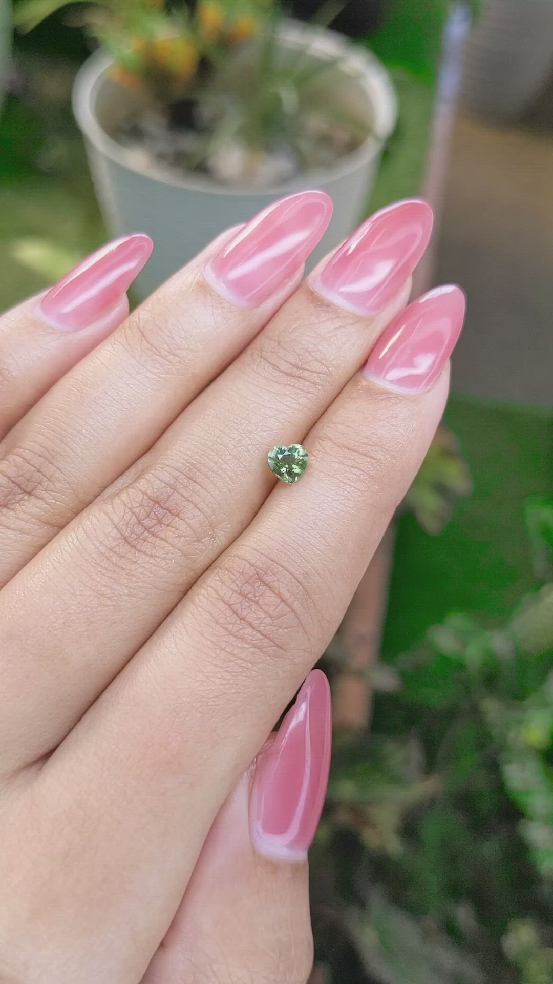 0.67 Ct. Yellowish Green Sapphire from Madagascar Size Video