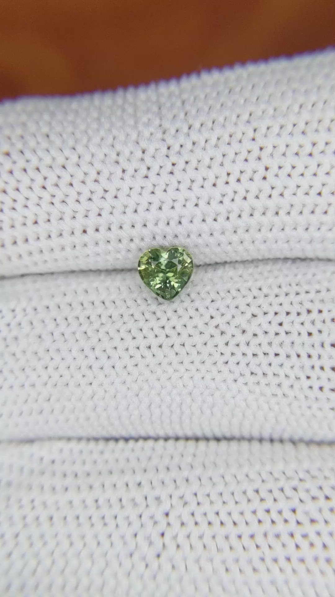 0.67 Ct. Yellowish Green Sapphire from Madagascar Size Video