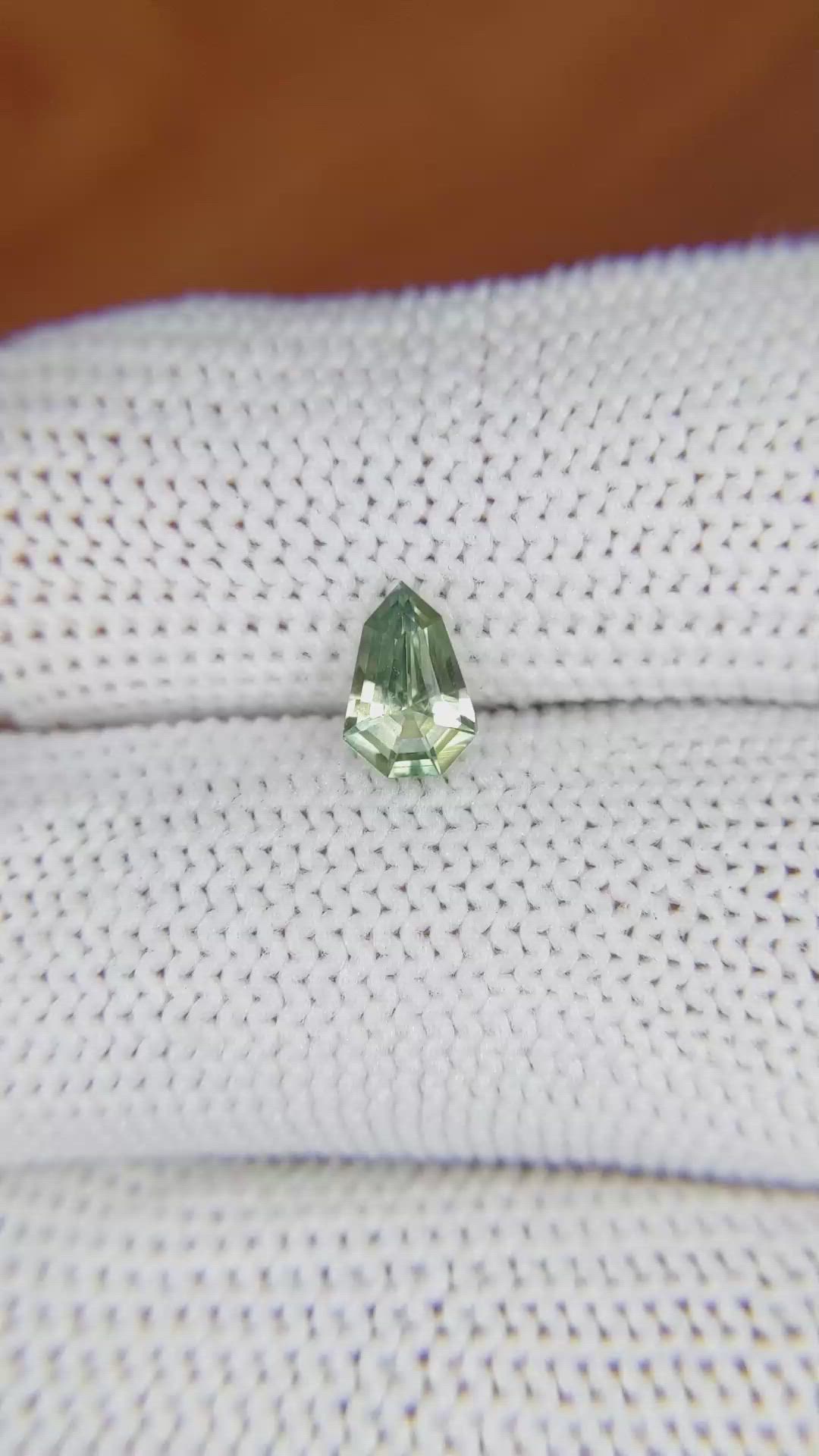 0.72 Ct. Yellowish Green Sapphire from Madagascar Size Video