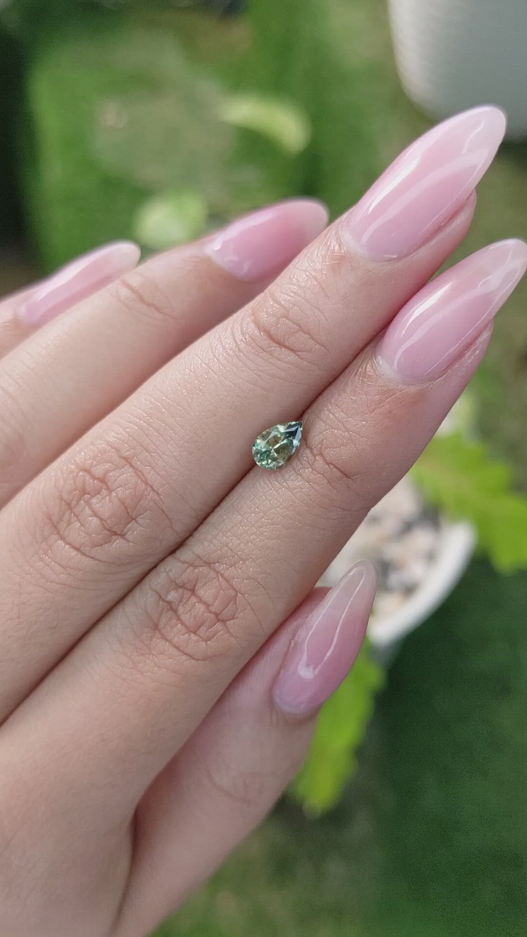 0.68 Ct. Yellowish Green Sapphire from Madagascar Size Video