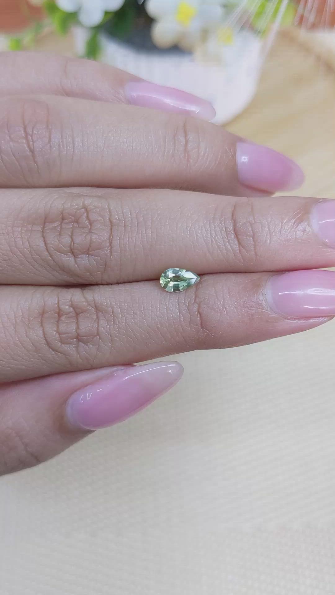 0.52 Ct. Yellowish Green Sapphire from Madagascar Size Video