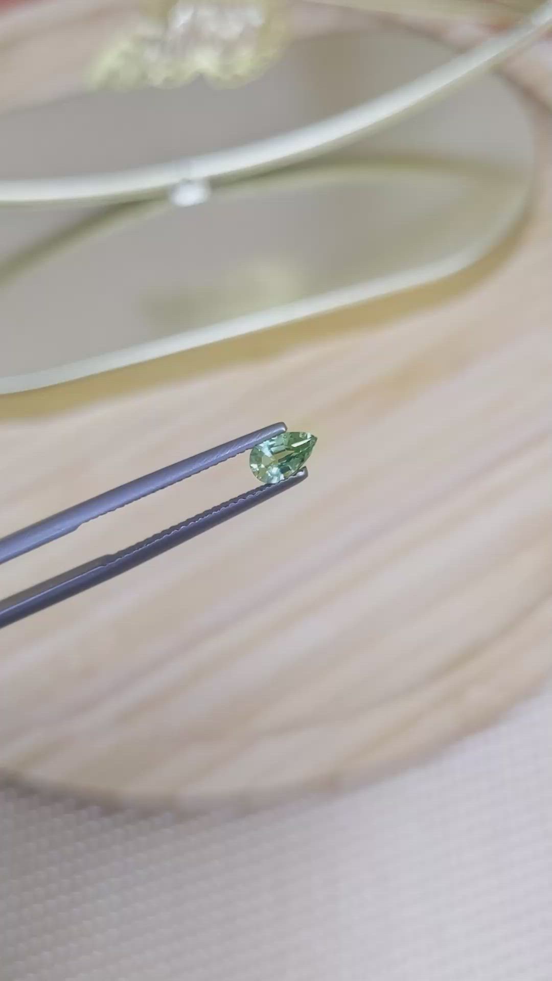 0.52 Ct. Yellowish Green Sapphire from Madagascar Size Video