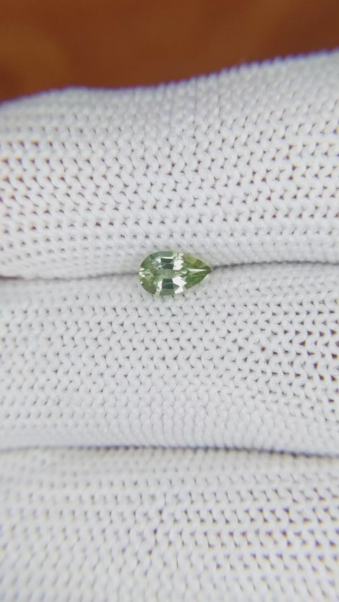 0.52 Ct. Yellowish Green Sapphire from Madagascar Size Video