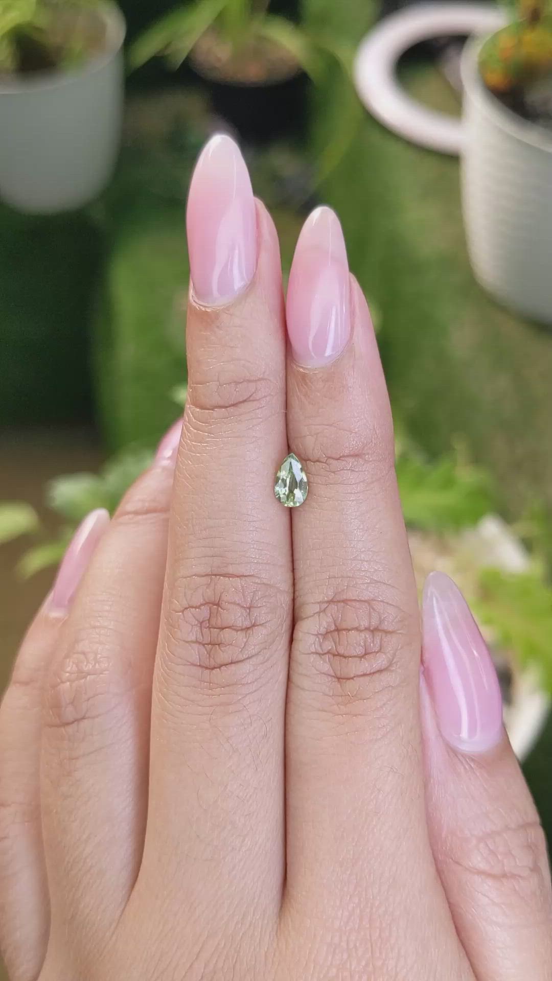 0.52 Ct. Yellowish Green Sapphire from Madagascar Size Video