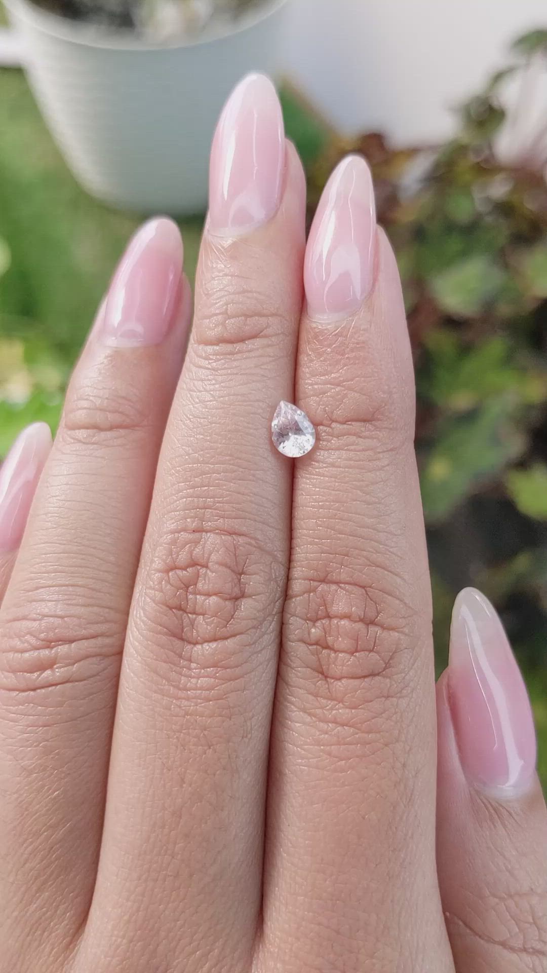 0.64 Ct. Peach Sapphire from Madagascar Size Video