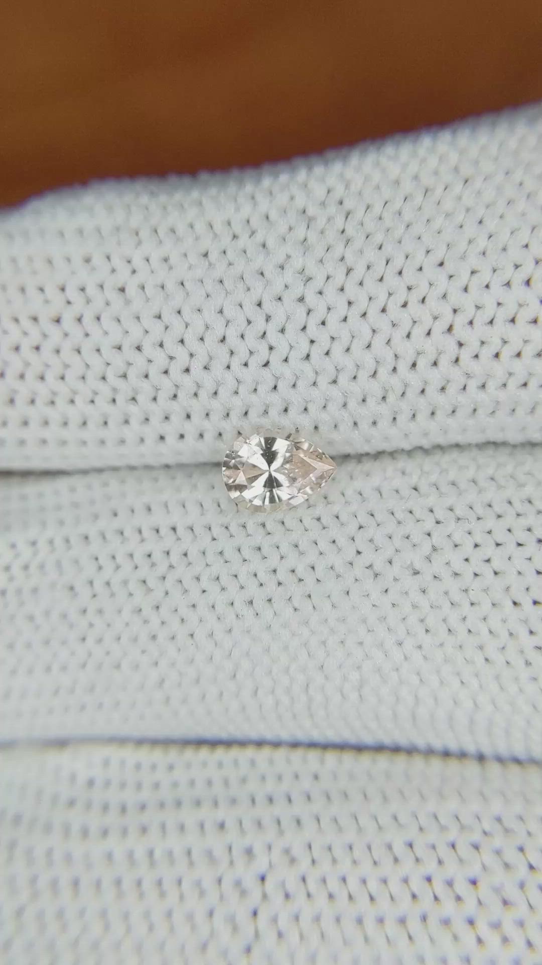 0.64 Ct. Peach Sapphire from Madagascar Size Video