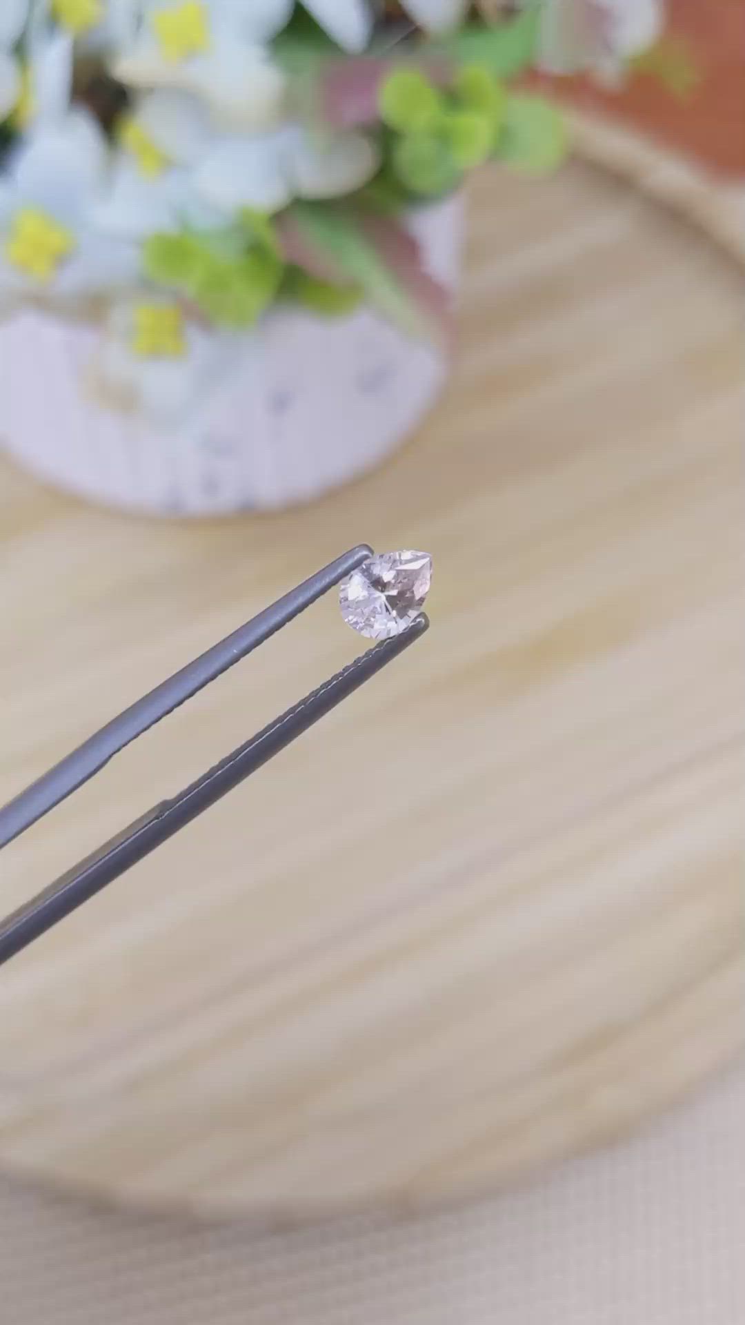 0.64 Ct. Peach Sapphire from Madagascar Size Video