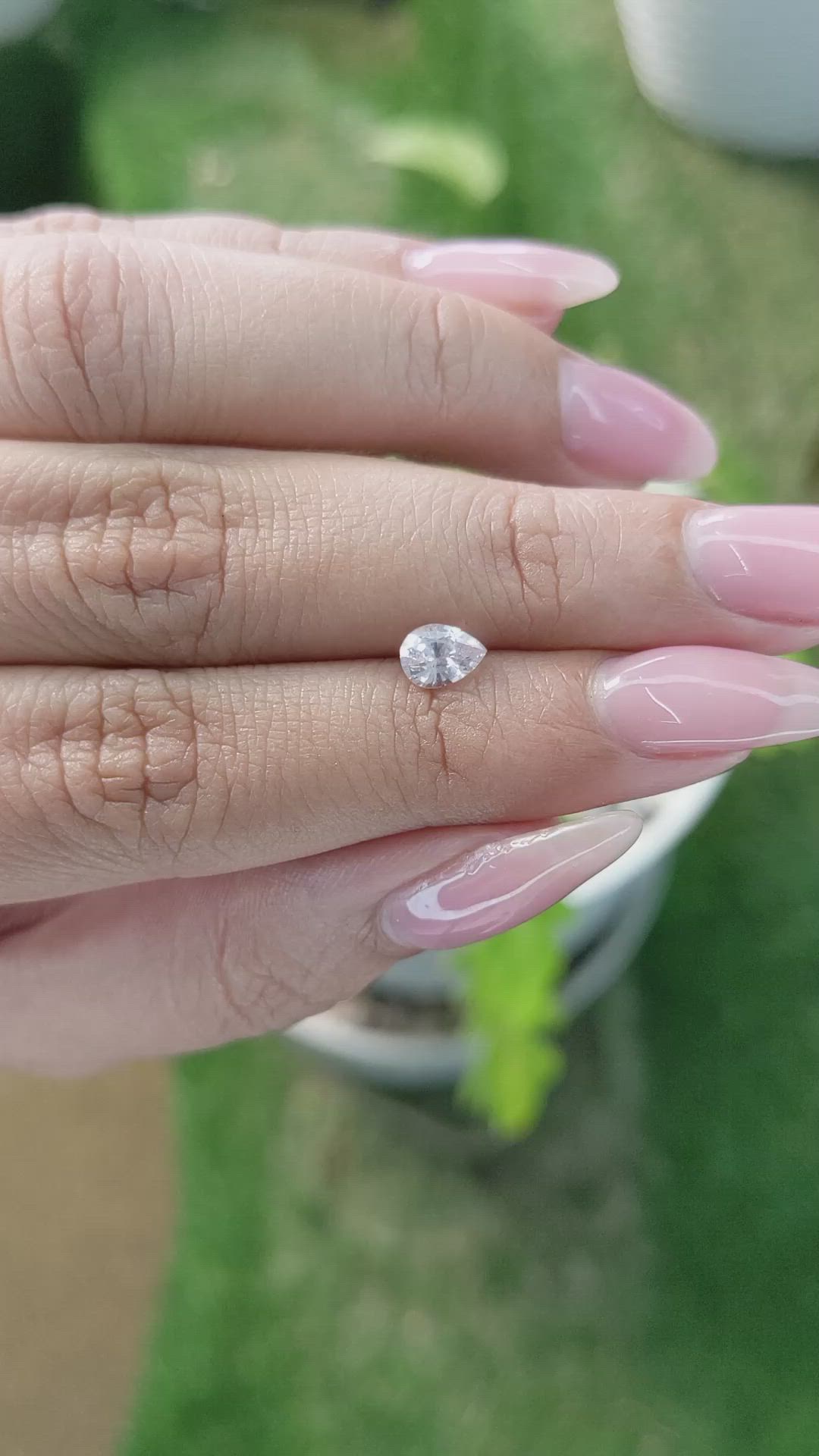 0.64 Ct. Peach Sapphire from Madagascar Size Video