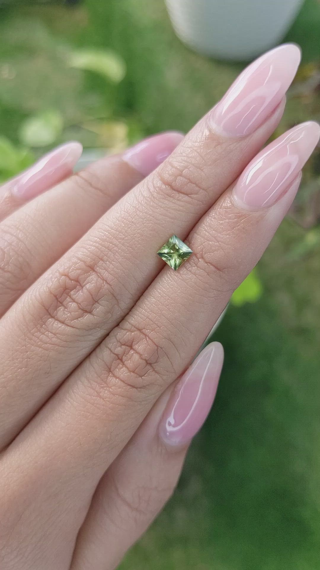 0.56 Ct. Yellowish Green Sapphire from Madagascar Size Video