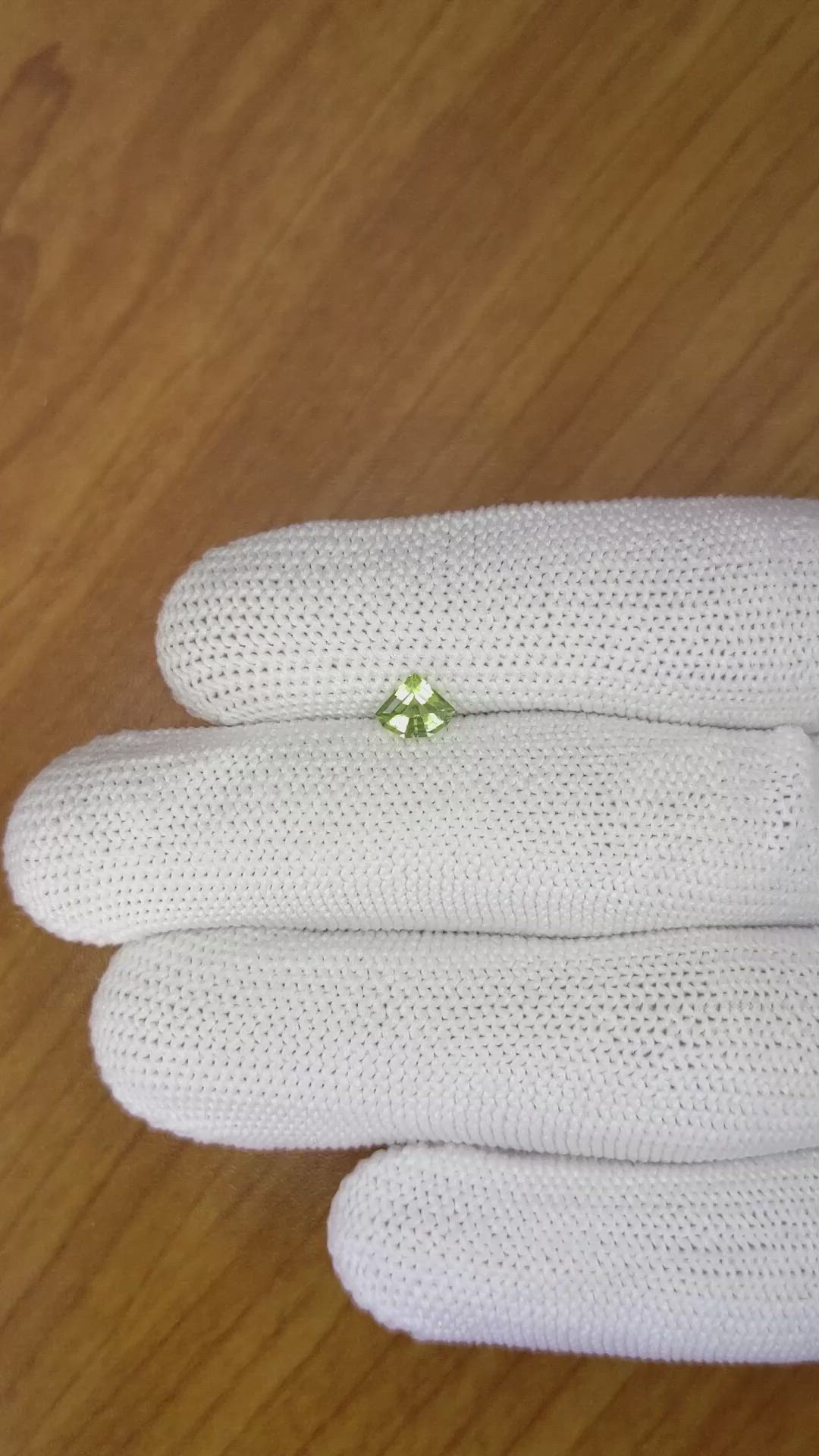 0.57 Ct. Yellowish Green Sapphire from Madagascar Size Video