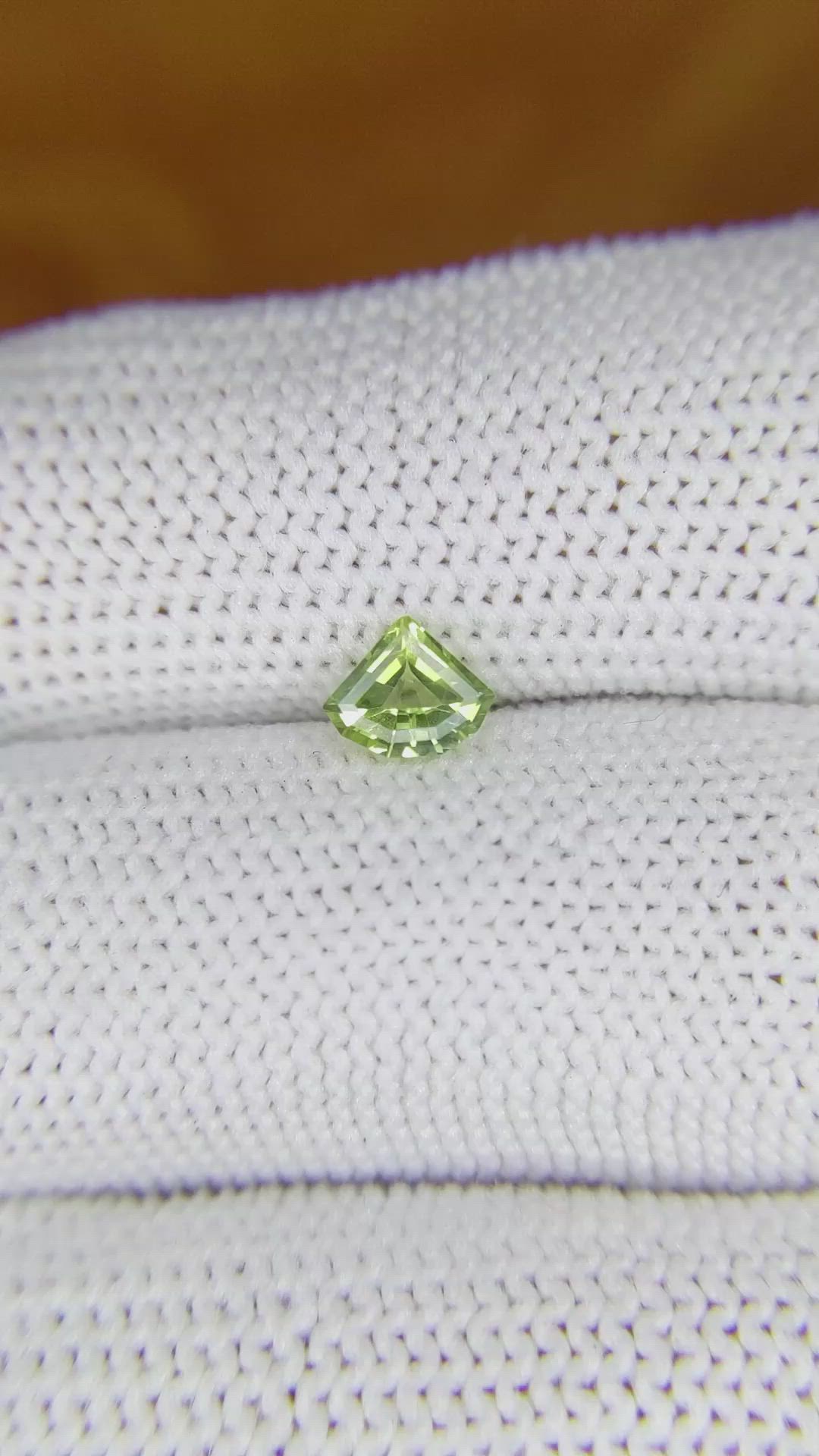 0.57 Ct. Yellowish Green Sapphire from Madagascar Size Video