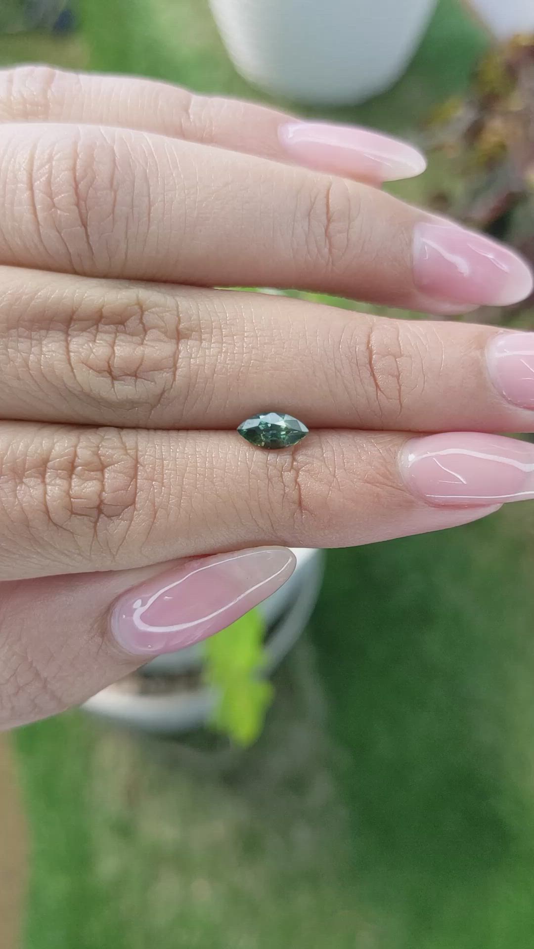 0.79 Ct. Bluish Green Sapphire from Madagascar Size Video