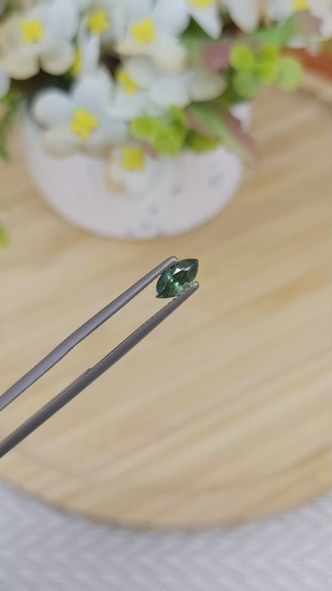 0.79 Ct. Bluish Green Sapphire from Madagascar Size Video