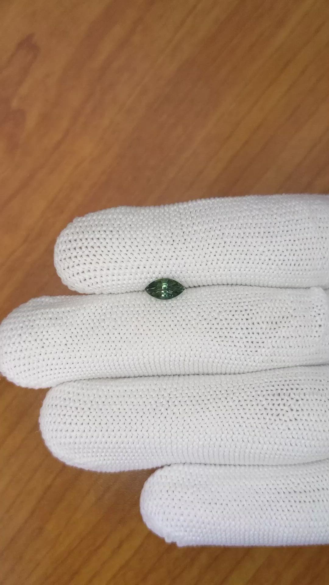 0.79 Ct. Bluish Green Sapphire from Madagascar Size Video