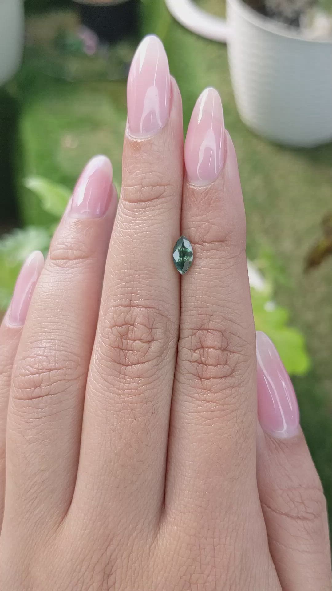 0.79 Ct. Bluish Green Sapphire from Madagascar Size Video