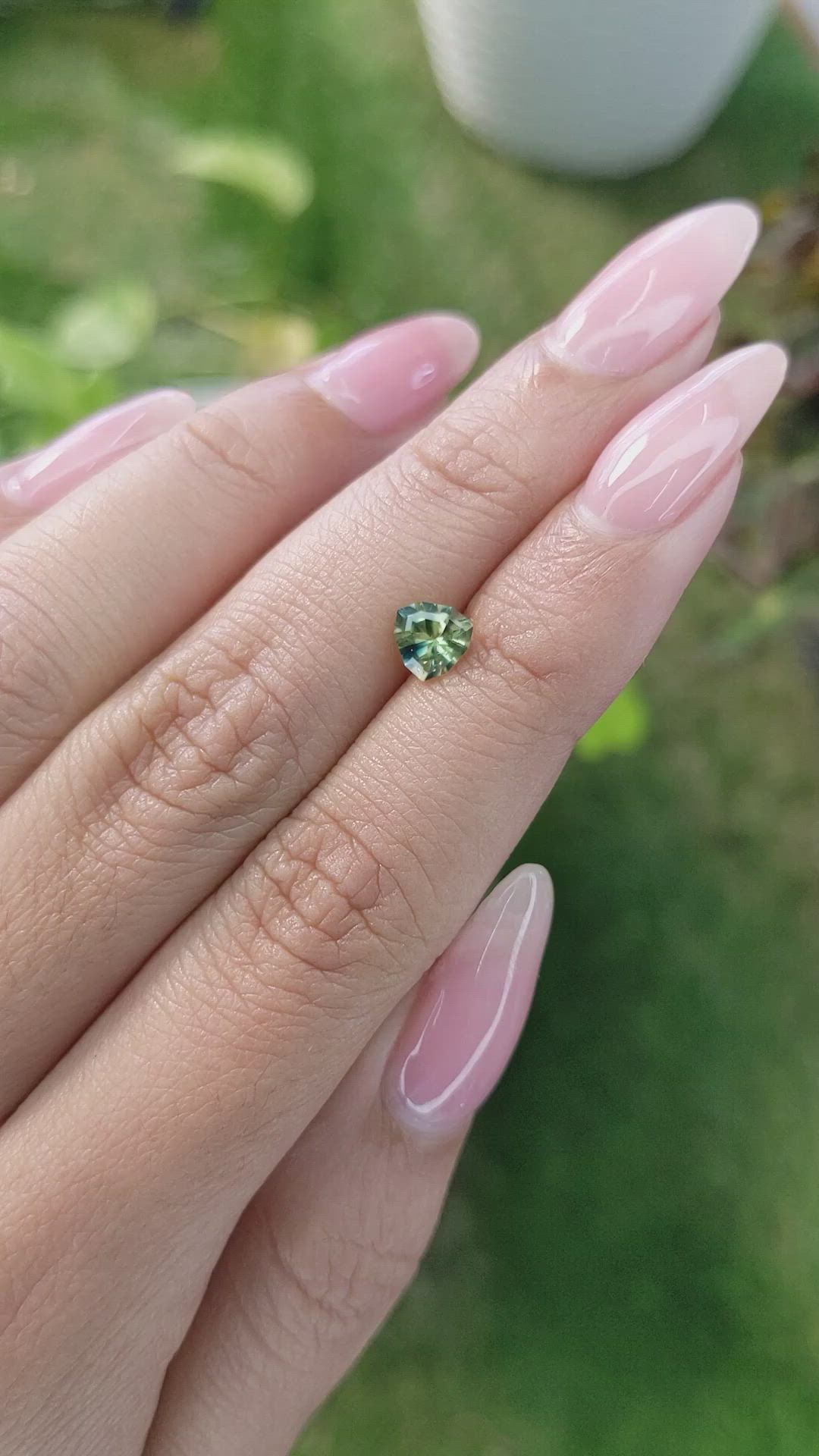 0.76 Ct. Yellowish Green Sapphire from Madagascar Size Video