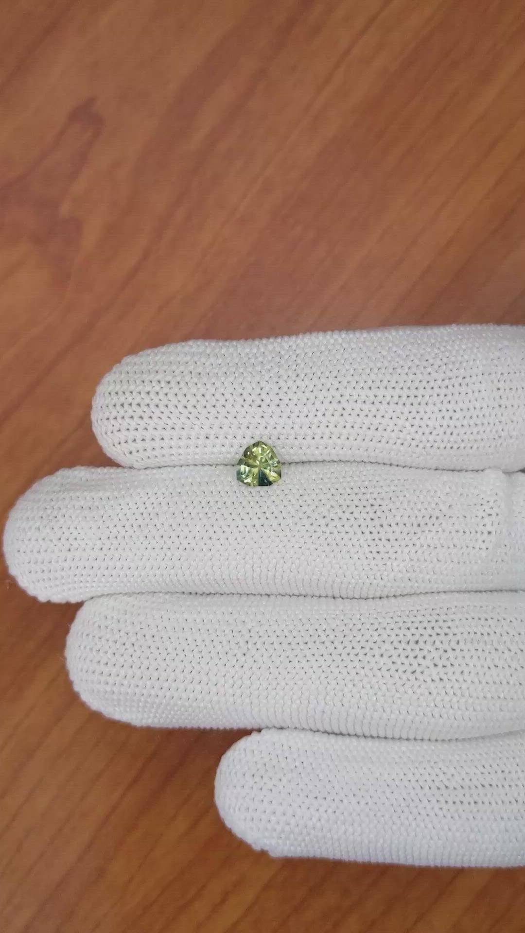 0.76 Ct. Yellowish Green Sapphire from Madagascar Size Video