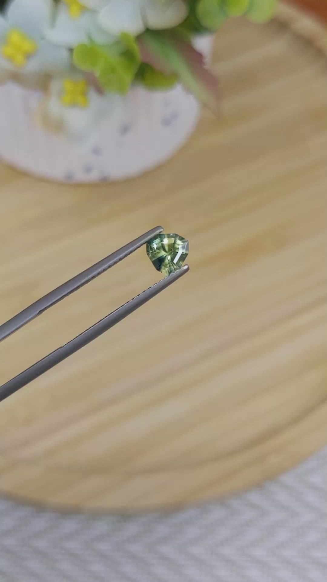 0.76 Ct. Yellowish Green Sapphire from Madagascar Size Video