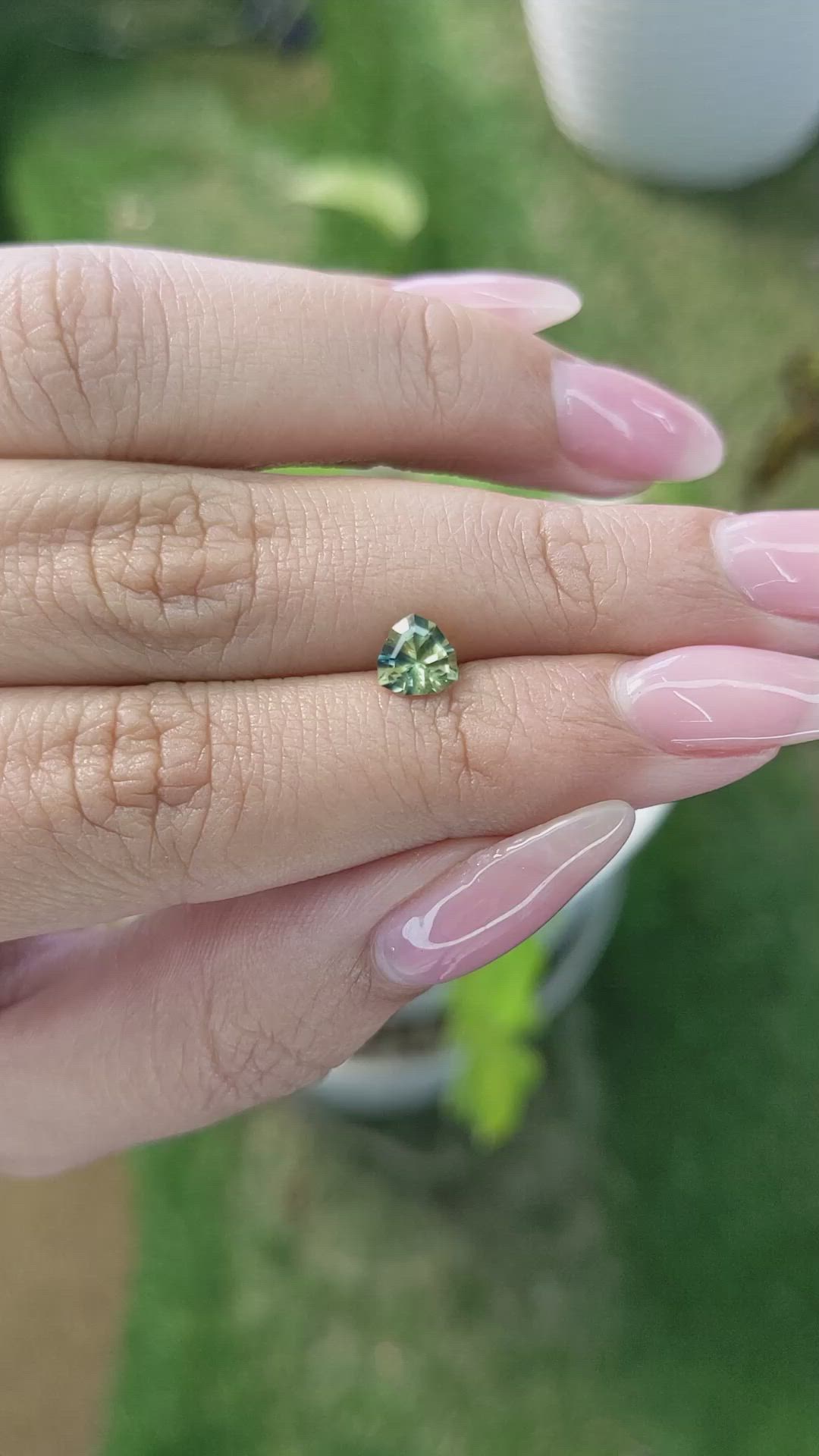 0.76 Ct. Yellowish Green Sapphire from Madagascar Size Video