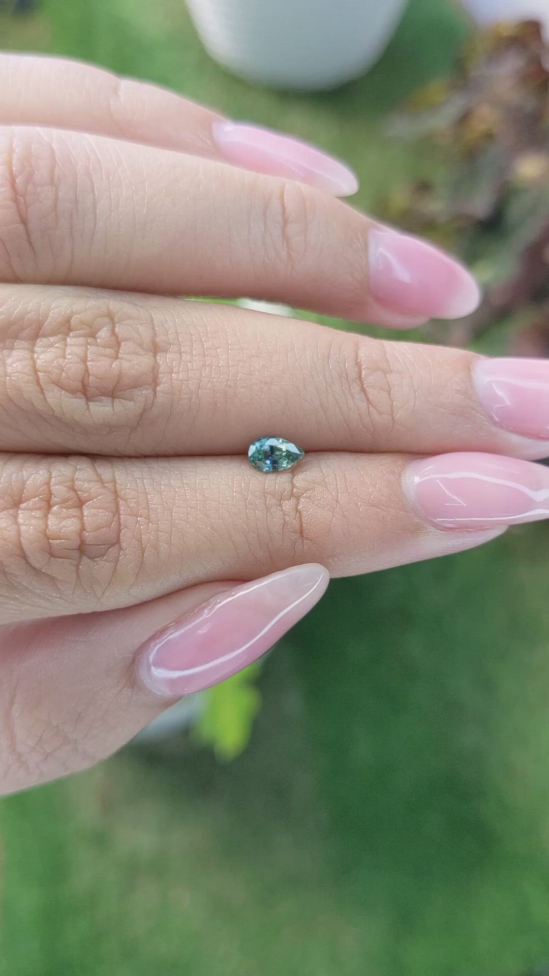 0.42 Ct. Bluish Green Sapphire from Madagascar Size Video