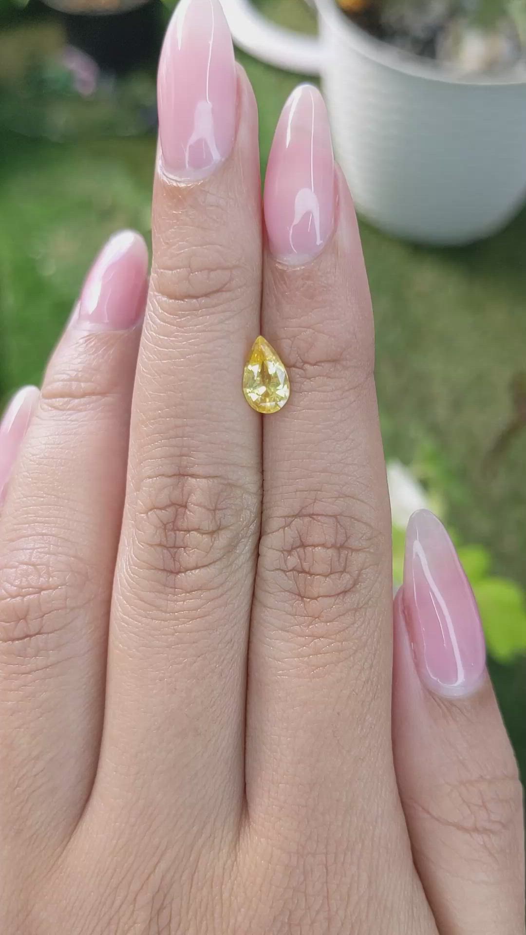 1.06 Ct. Orangish Yellow Sapphire from Ceylon (Sri Lanka) Size Video