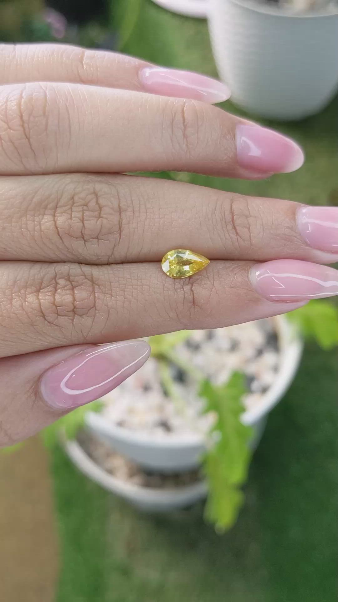 1.06 Ct. Orangish Yellow Sapphire from Ceylon (Sri Lanka) Size Video