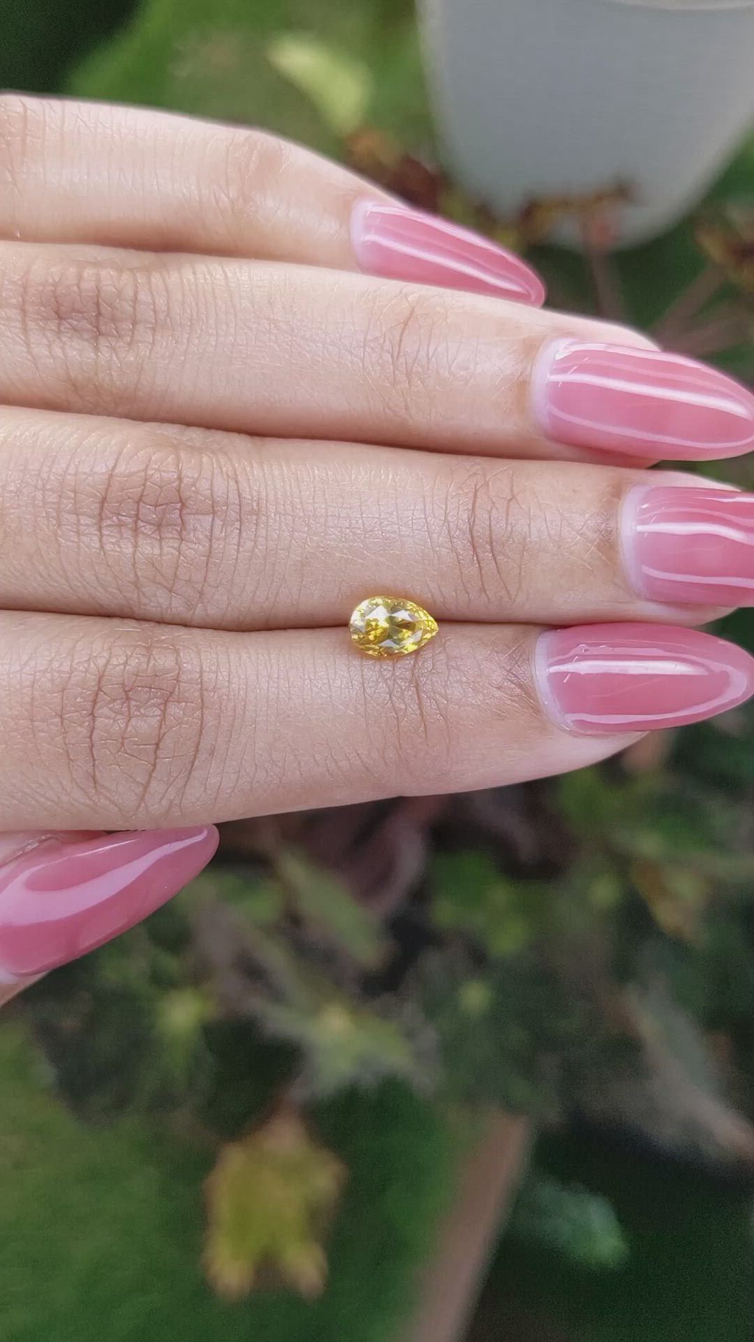 1.12 Ct. Orangish Yellow Sapphire from Ceylon (Sri Lanka) Size Video