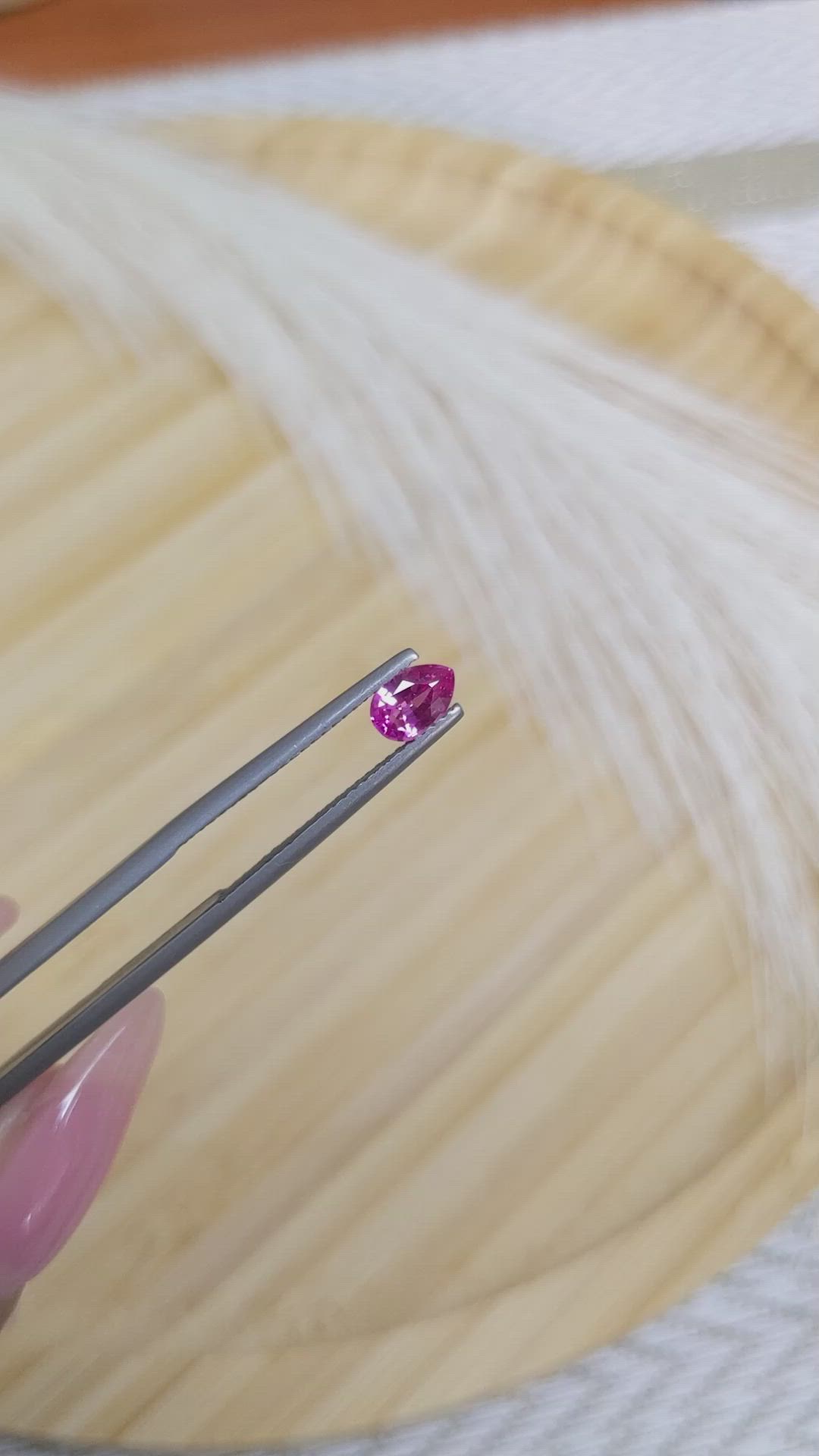 0.57 Ct. Reddish Pink Sapphire from Ceylon (Sri Lanka) Size Video