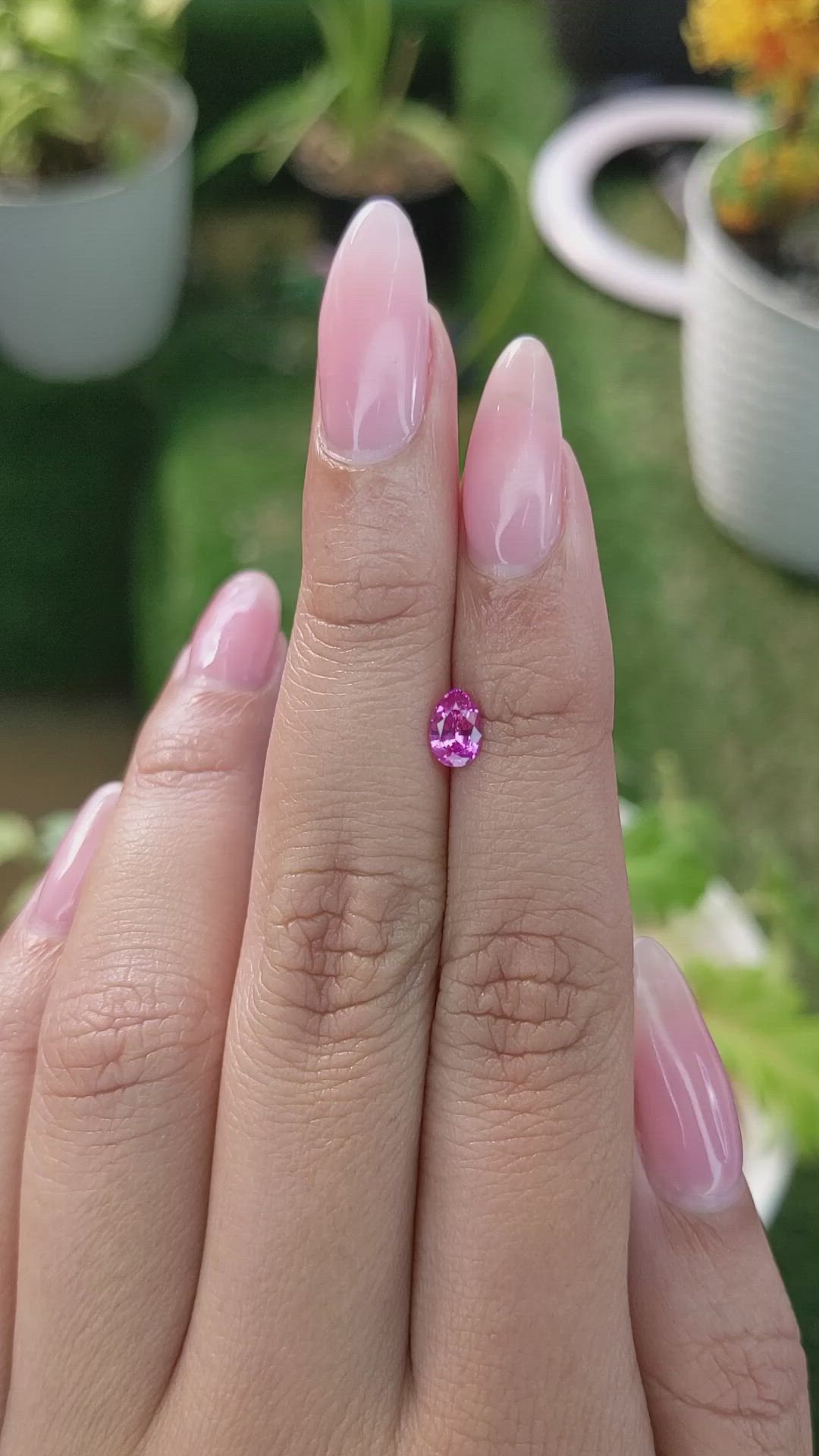 0.57 Ct. Reddish Pink Sapphire from Ceylon (Sri Lanka) Size Video