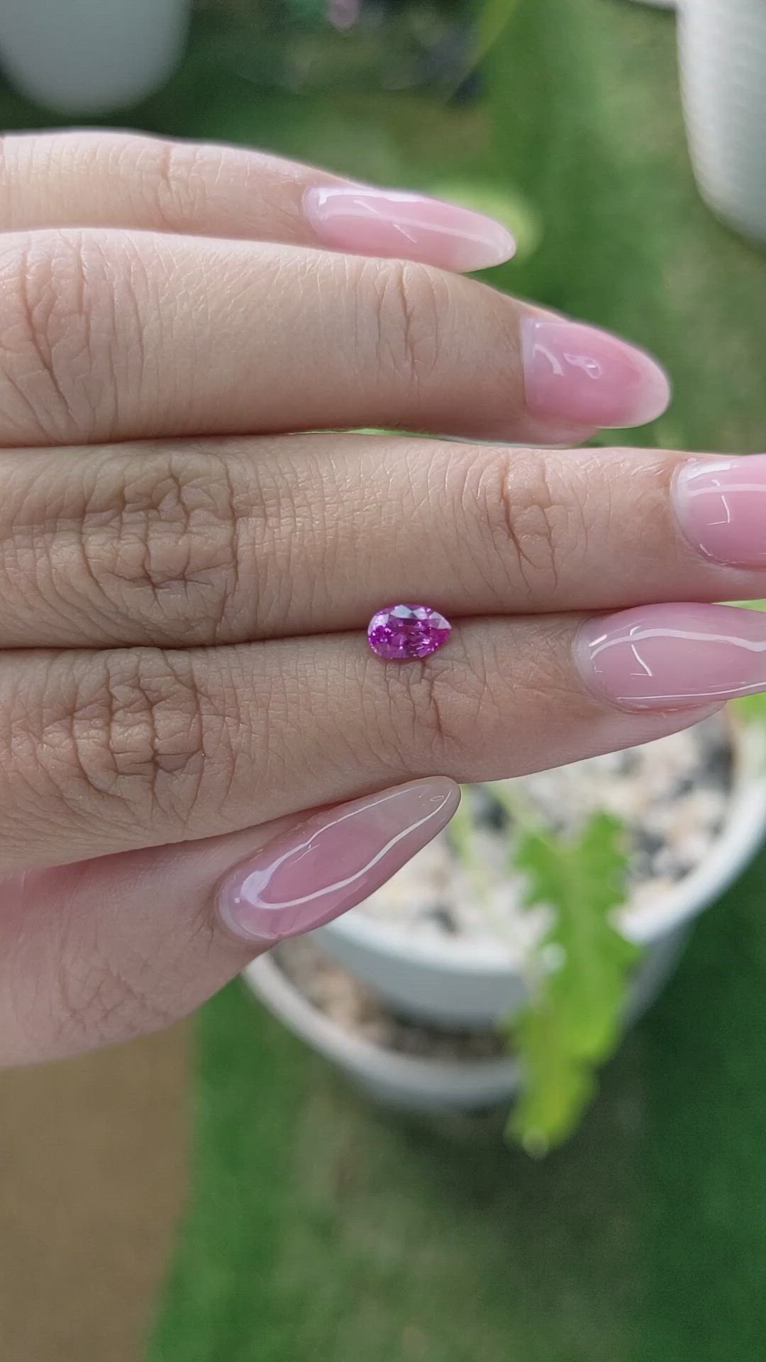 0.57 Ct. Reddish Pink Sapphire from Ceylon (Sri Lanka) Size Video