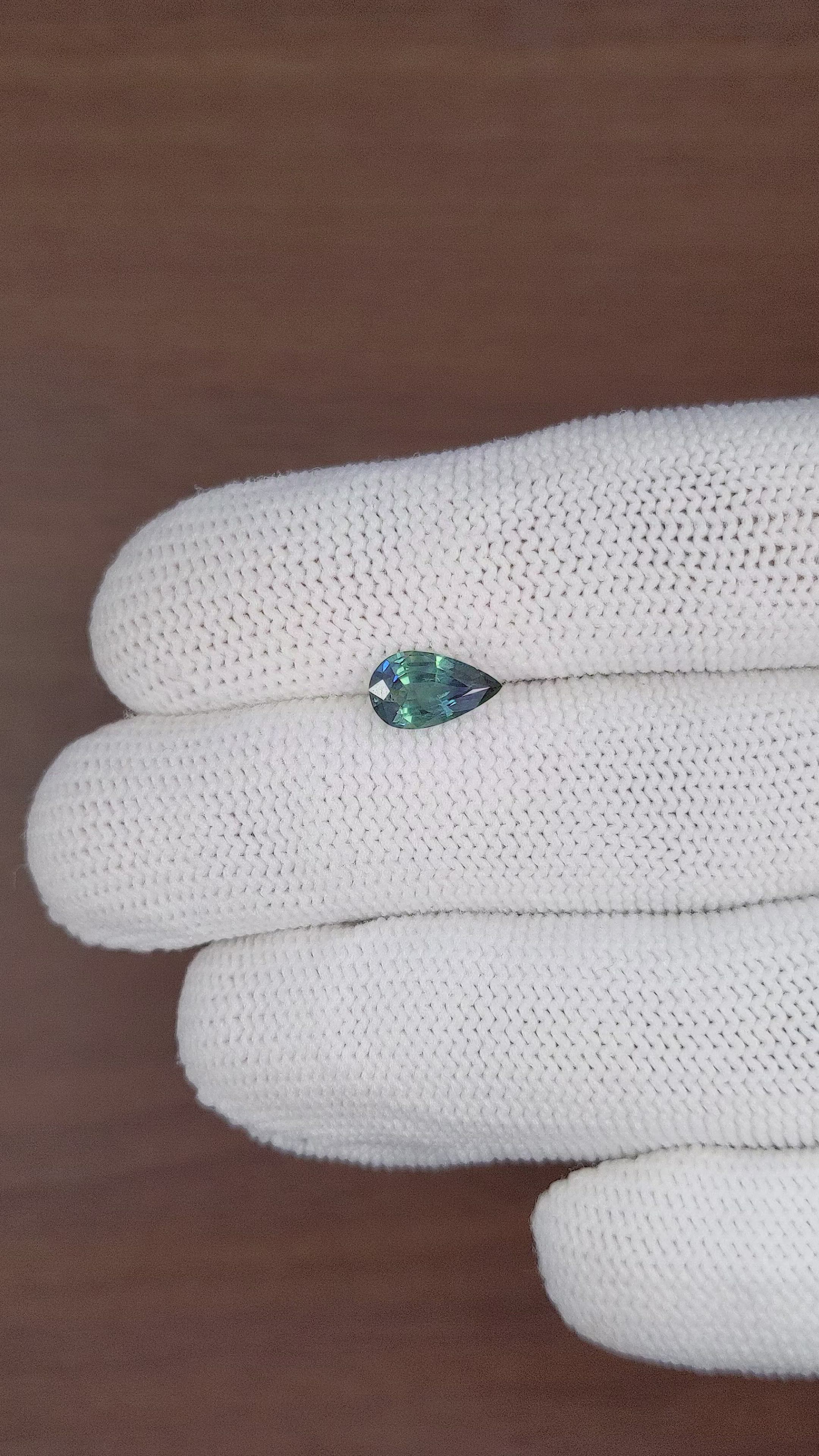 1.36 Ct. Bluish Green Sapphire from Madagascar Size Video