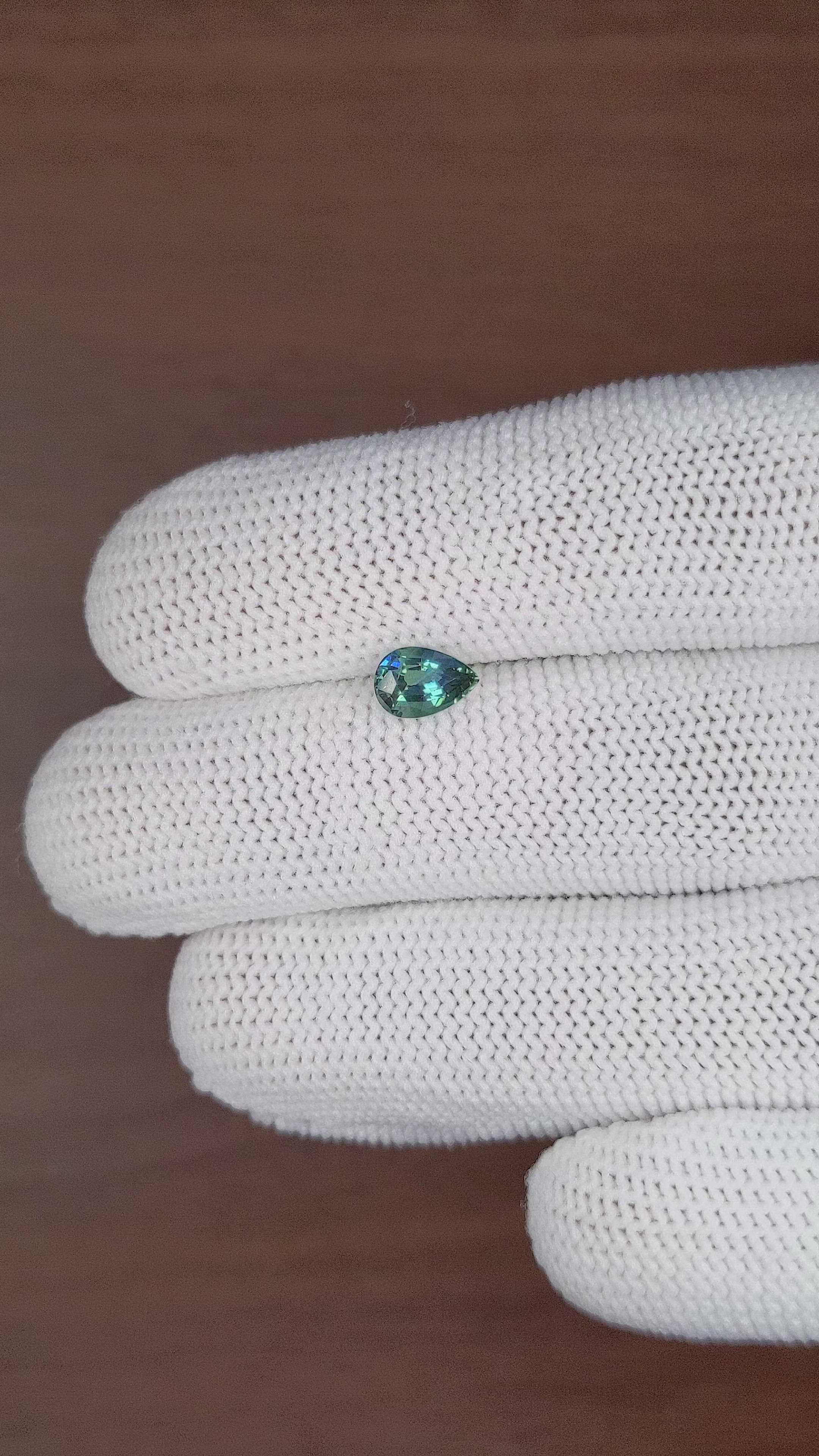 1.06 Ct. Bluish Green Sapphire from Madagascar Size Video