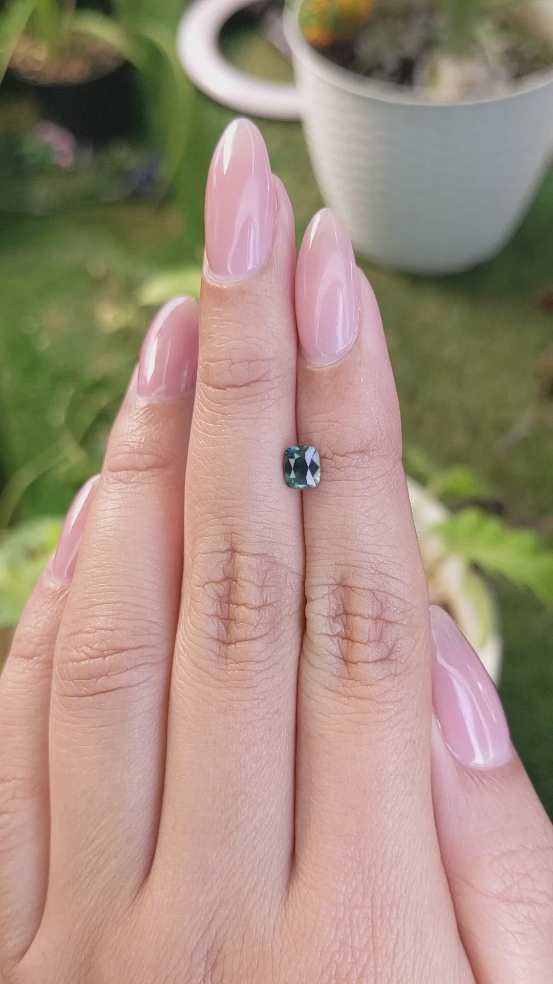 0.68 Ct. Bluish Green Sapphire from Madagascar Size Video