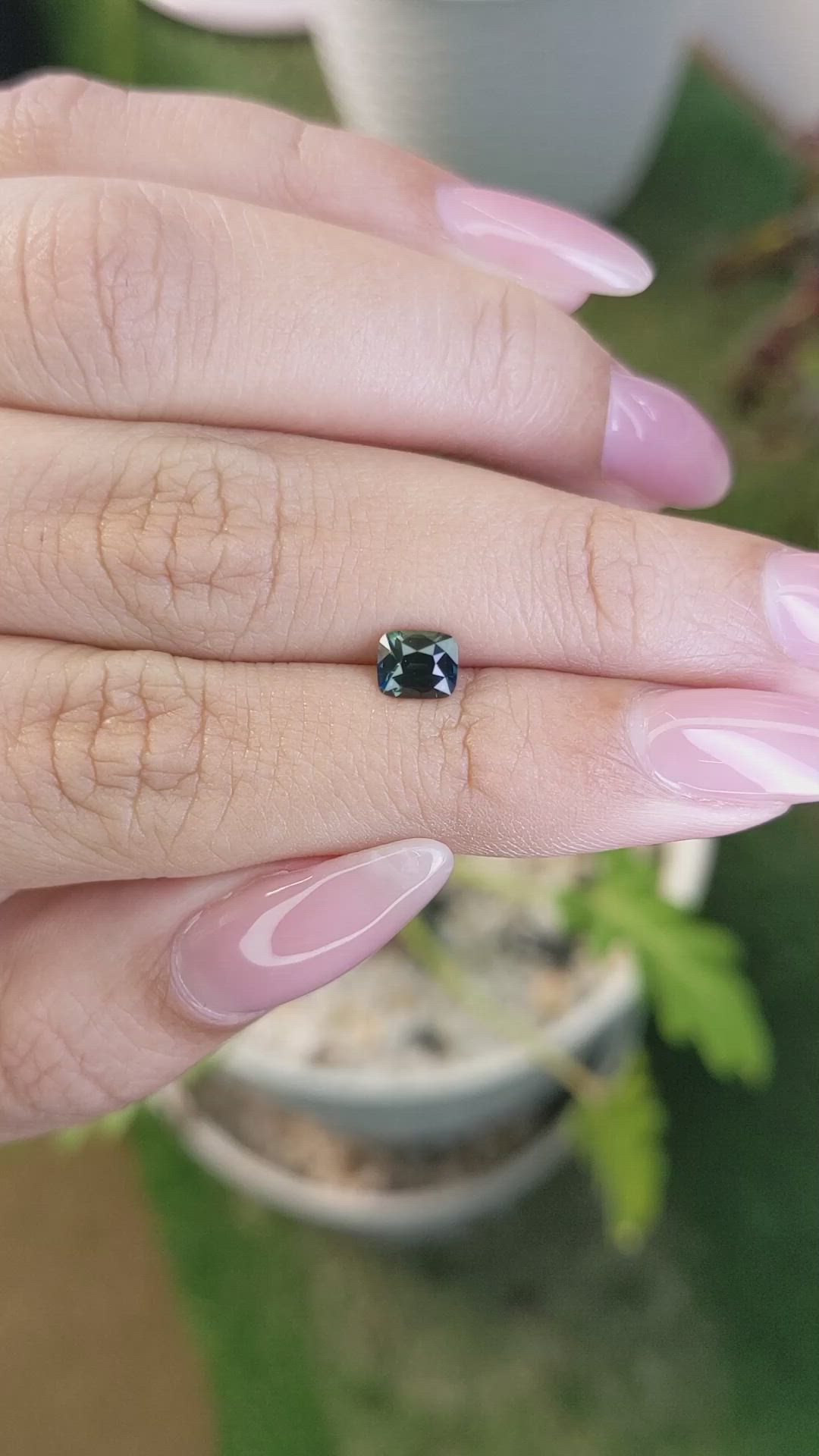 0.76 Ct. Bluish Green Sapphire from Madagascar Size Video