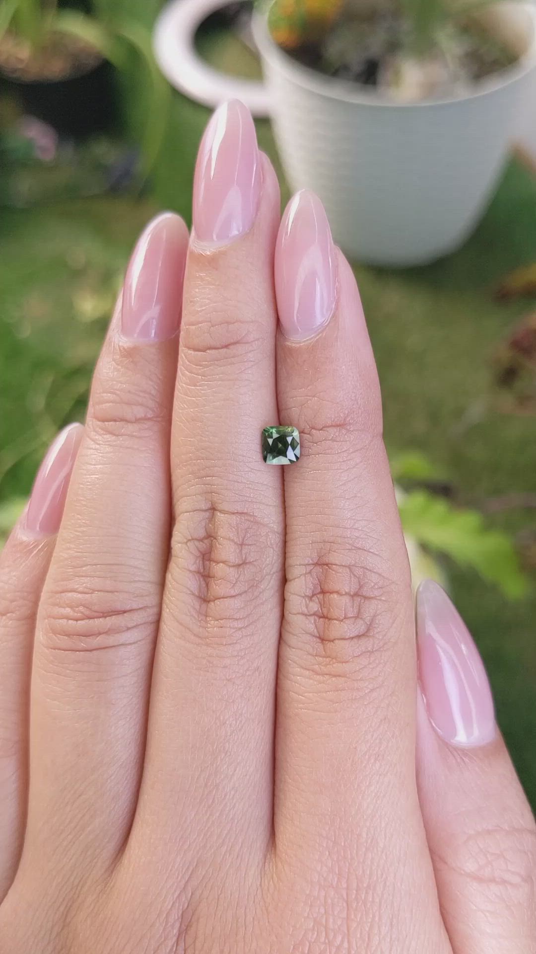 0.61 Ct. Yellowish Green Sapphire from Madagascar Size Video