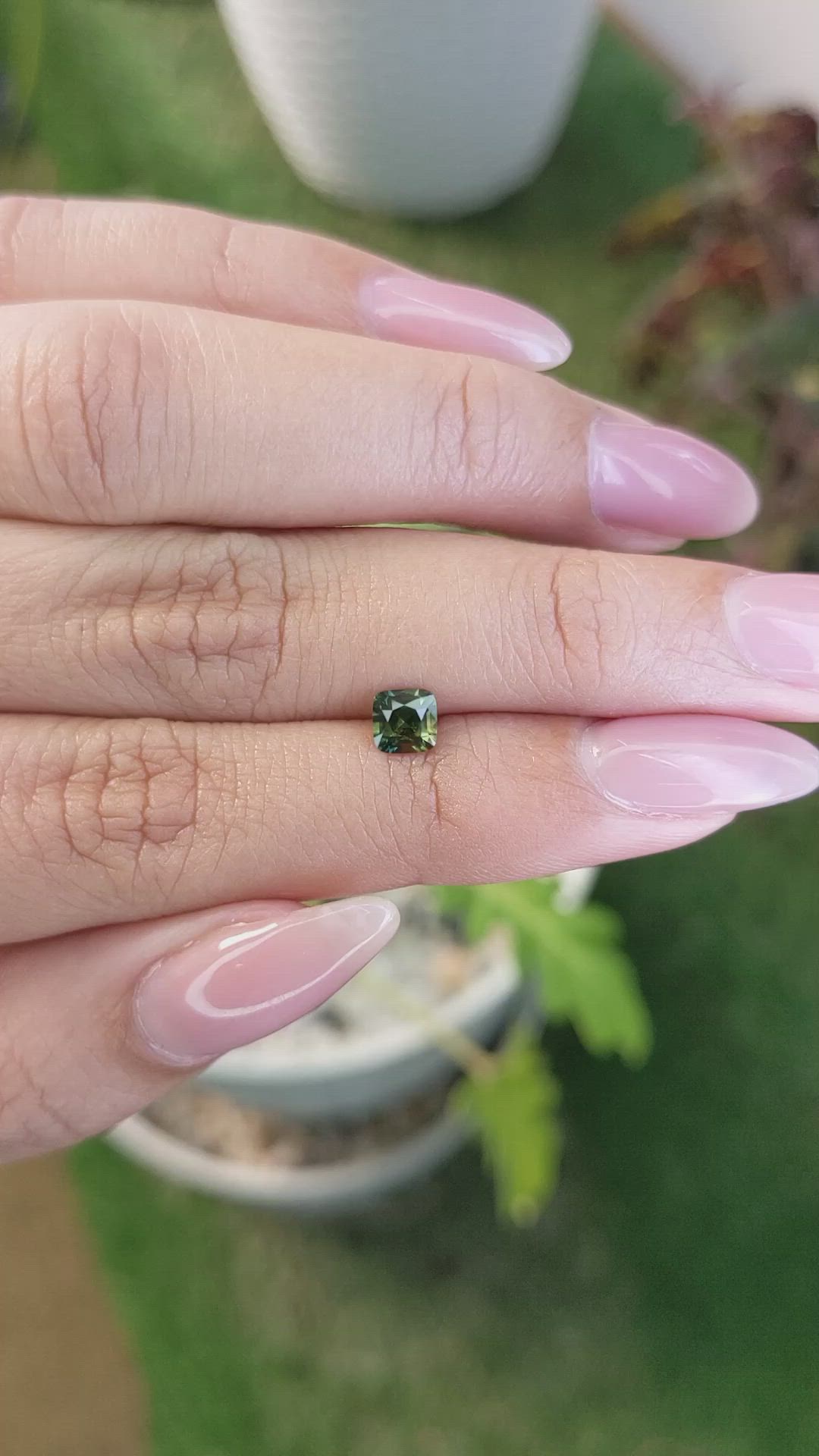 0.61 Ct. Yellowish Green Sapphire from Madagascar Size Video