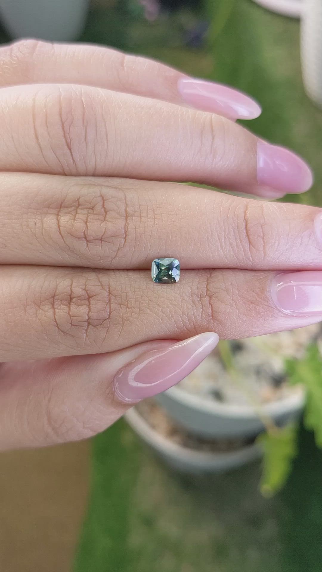 0.58 Ct. Bluish Green Sapphire from Madagascar Size Video