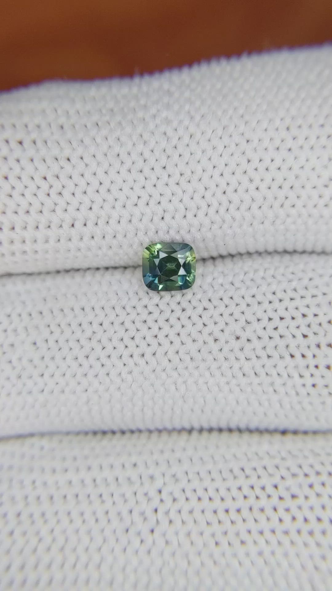 0.58 Ct. Bluish Green Sapphire from Madagascar Size Video