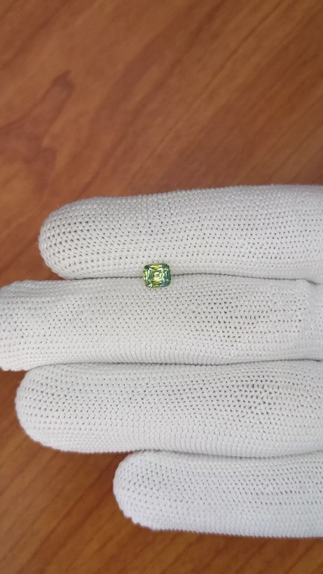 0.67 Ct. Yellowish Green Sapphire from Madagascar Size Video