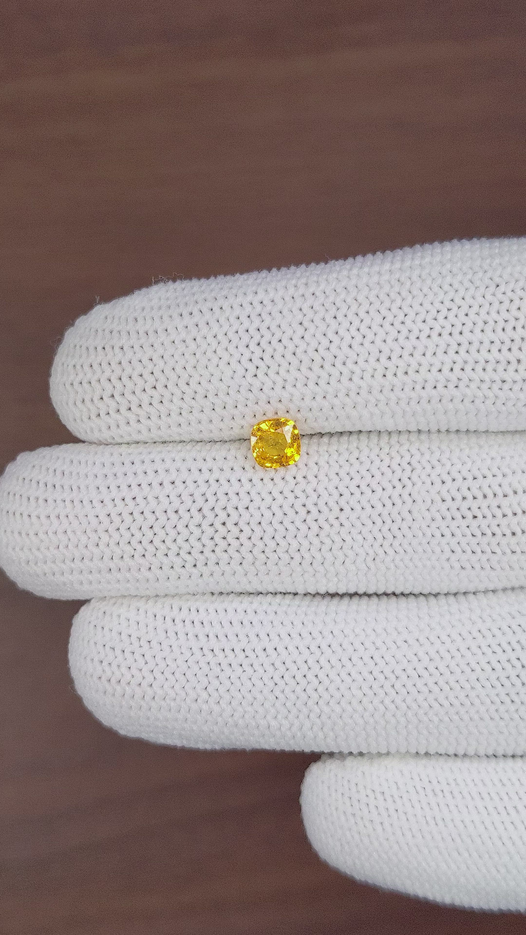 0.66 Ct. Orangish Yellow Sapphire from Ceylon (Sri Lanka) Size Video