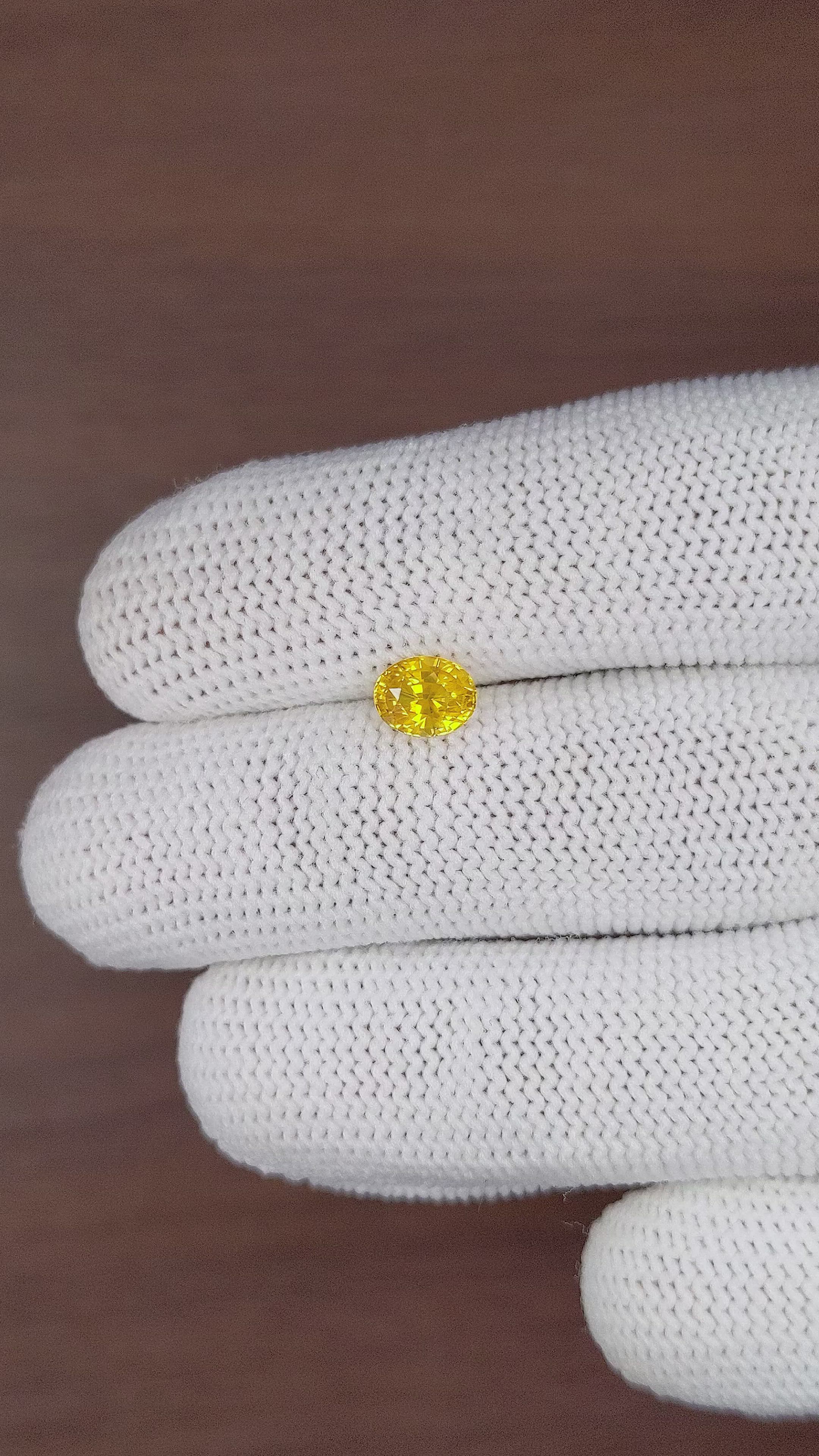 1.12 Ct. Orangish Yellow Sapphire from Ceylon (Sri Lanka) Size Video
