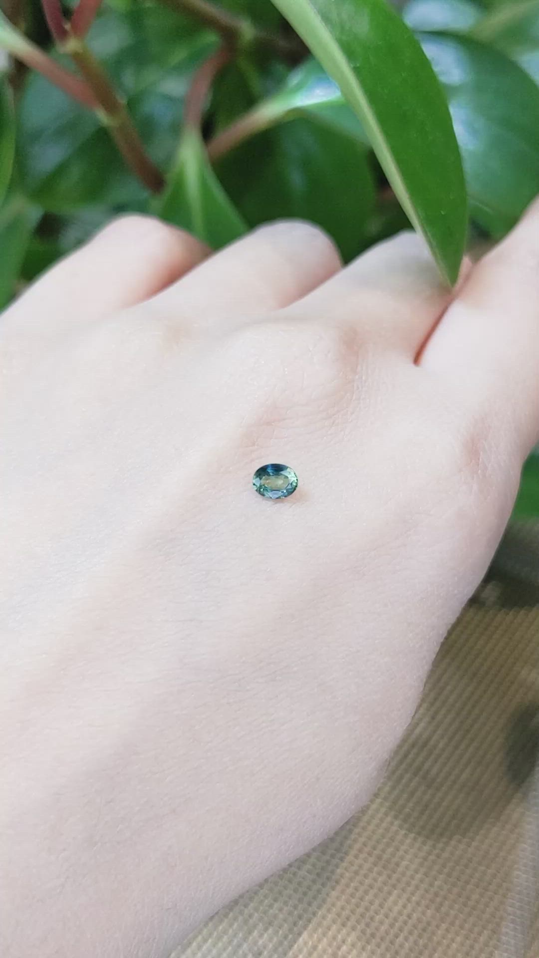 0.38 Ct. Bluish Green Sapphire from Thailand Size Video