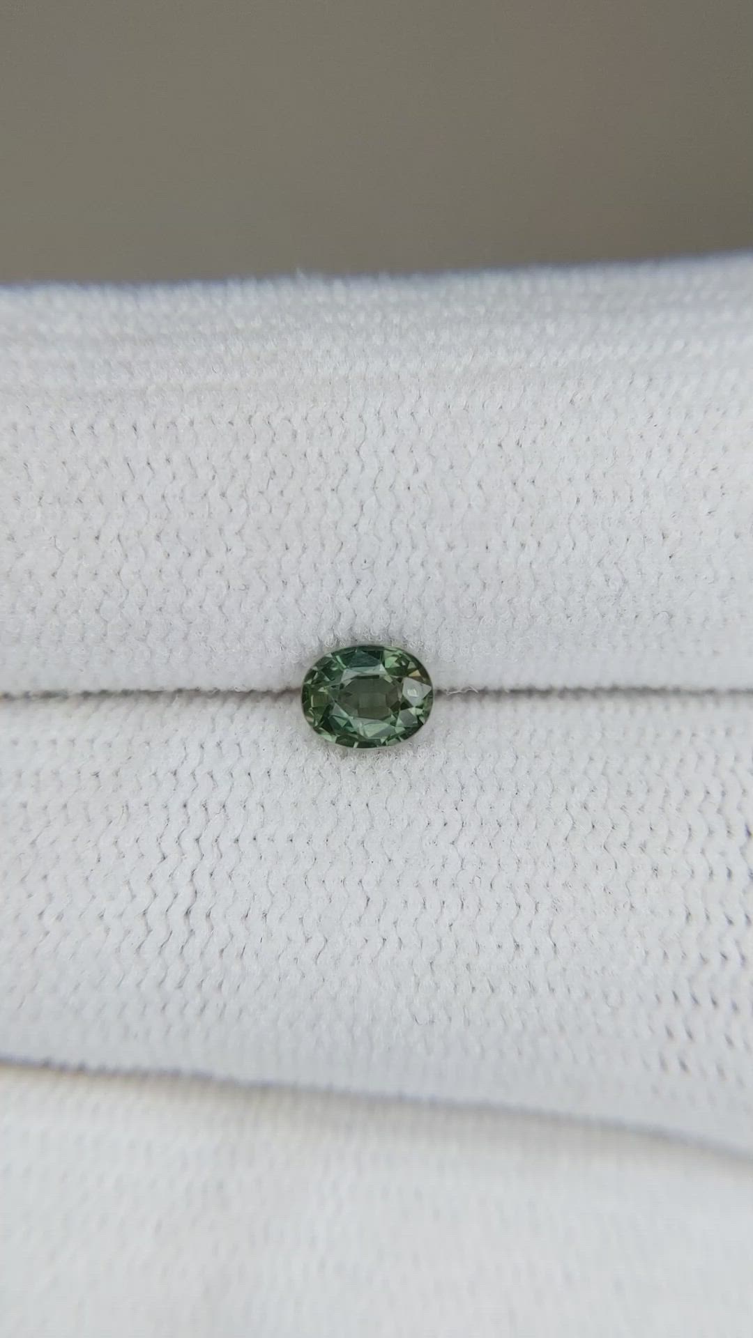 0.39 Ct. Yellowish Green Sapphire from Thailand Size Video