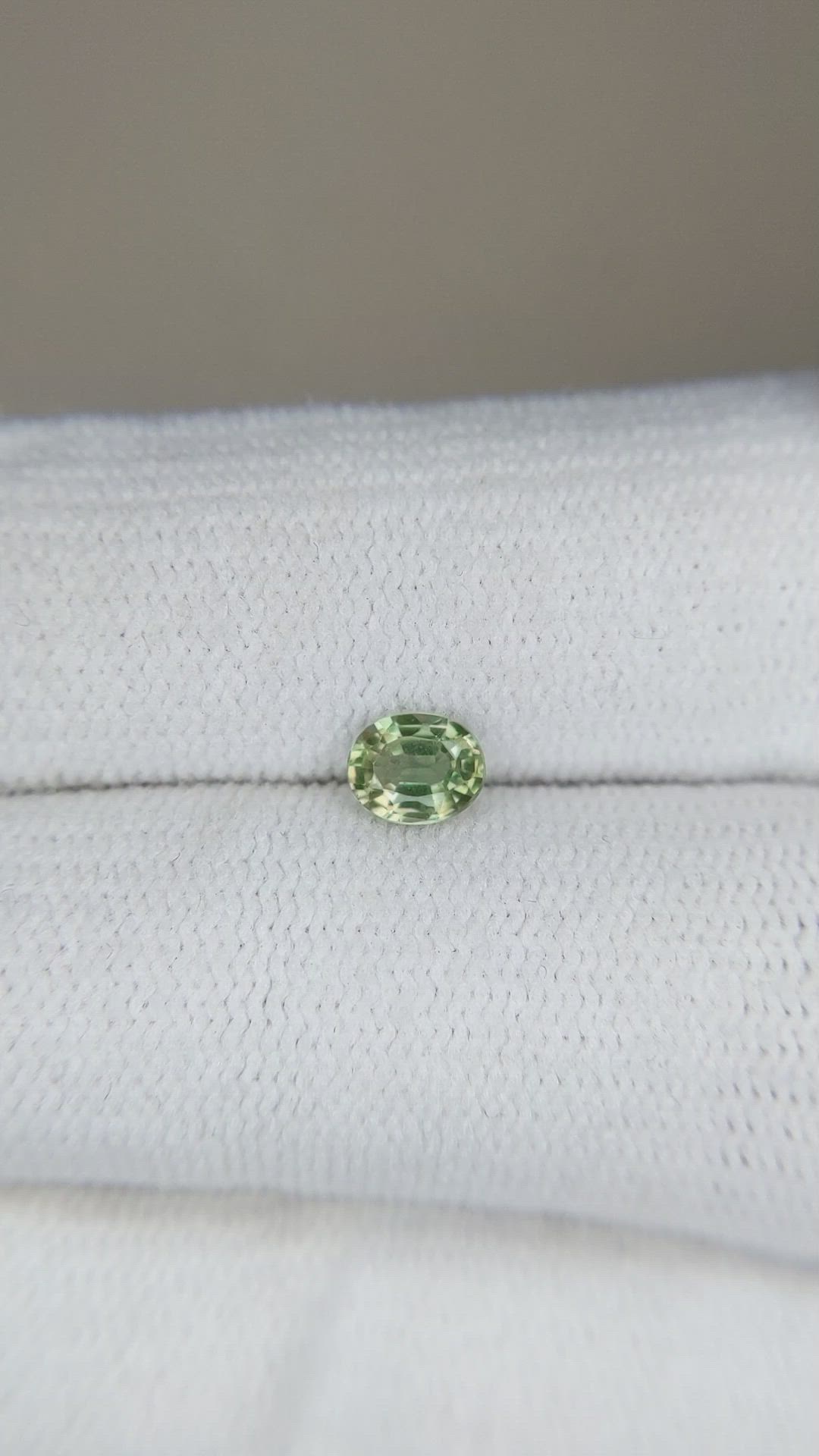 0.47 Ct. Yellowish Green Sapphire from Thailand Size Video