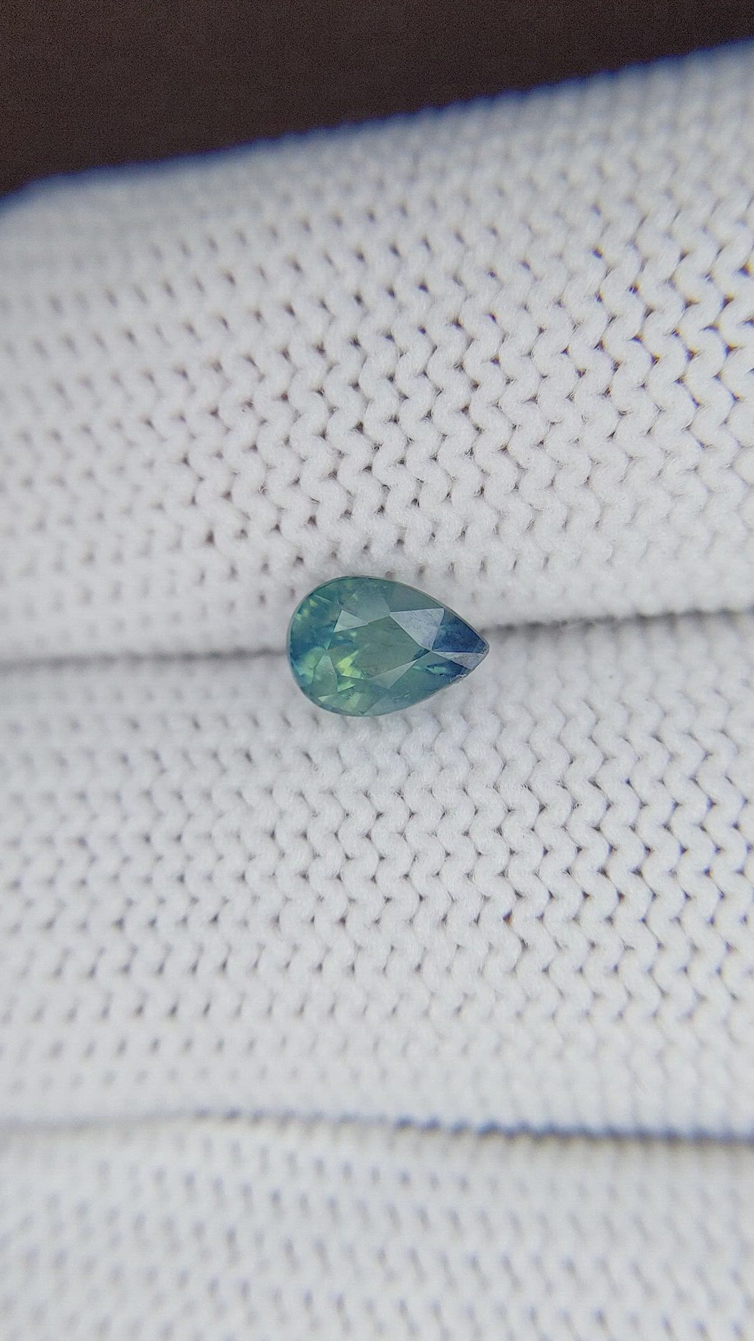 0.93 Ct. Bluish Green Sapphire from Madagascar Size Video