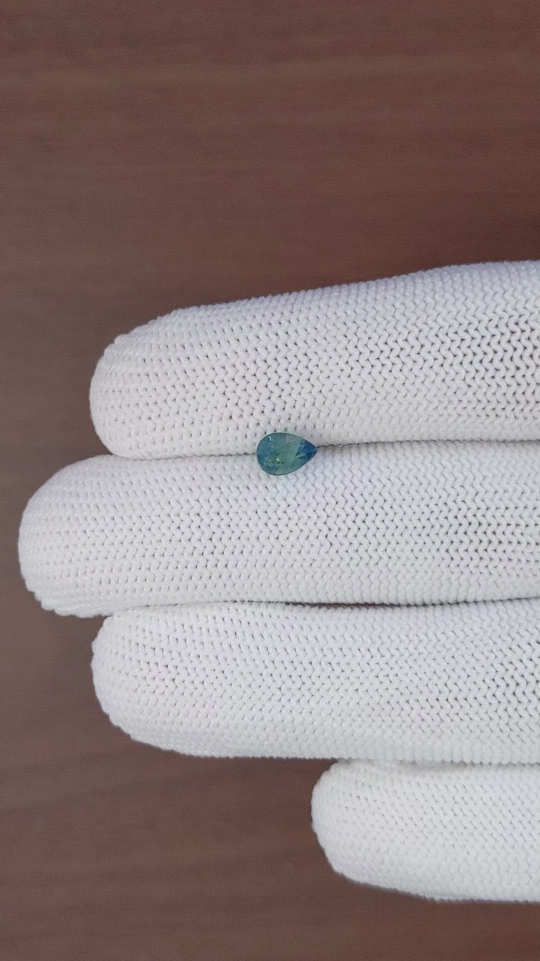 0.93 Ct. Bluish Green Sapphire from Madagascar Size Video