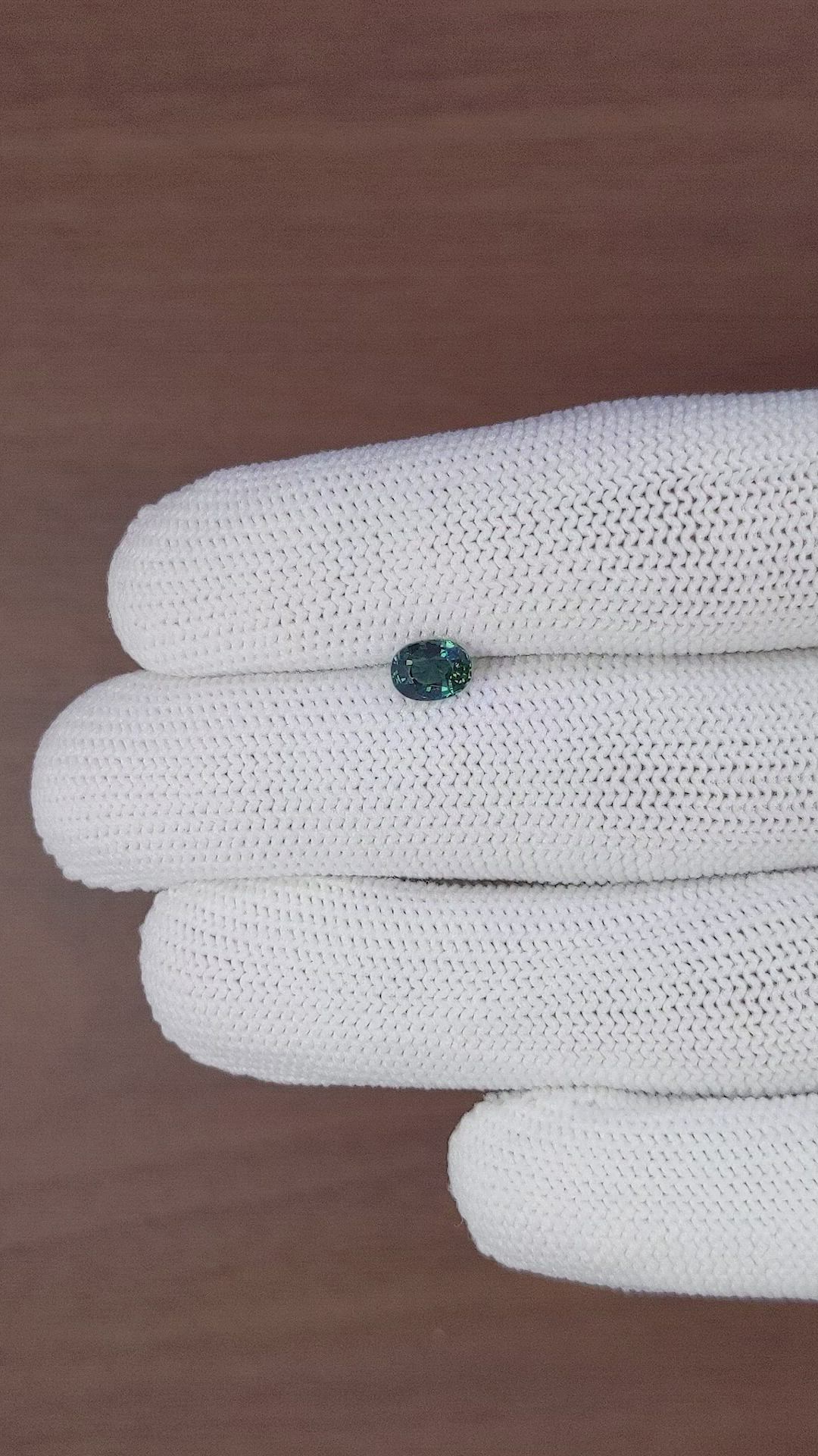 0.87 Ct. Bluish Green Sapphire from Madagascar Size Video