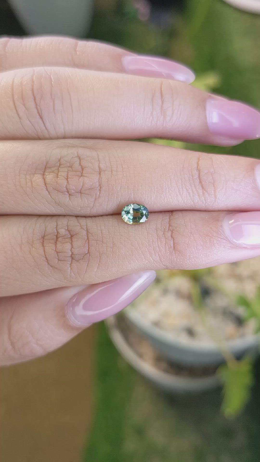 0.63 Ct. Yellowish Green Sapphire from Madagascar Size Video