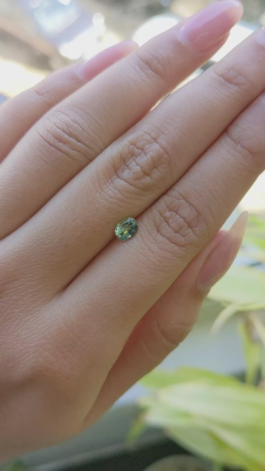 0.63 Ct. Yellowish Green Sapphire from Madagascar Size Video